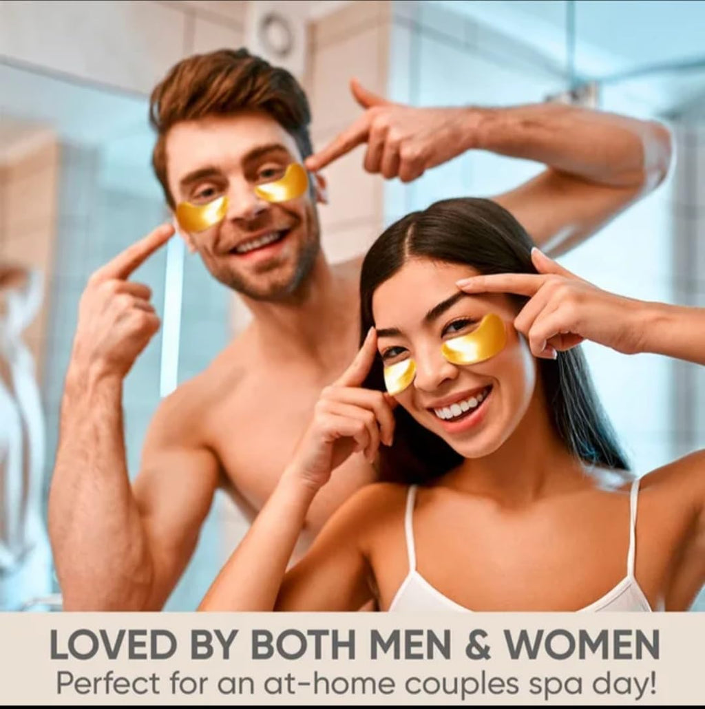 Man and woman with gold eye masks, pointing to their eyes, in a bathroom setting.